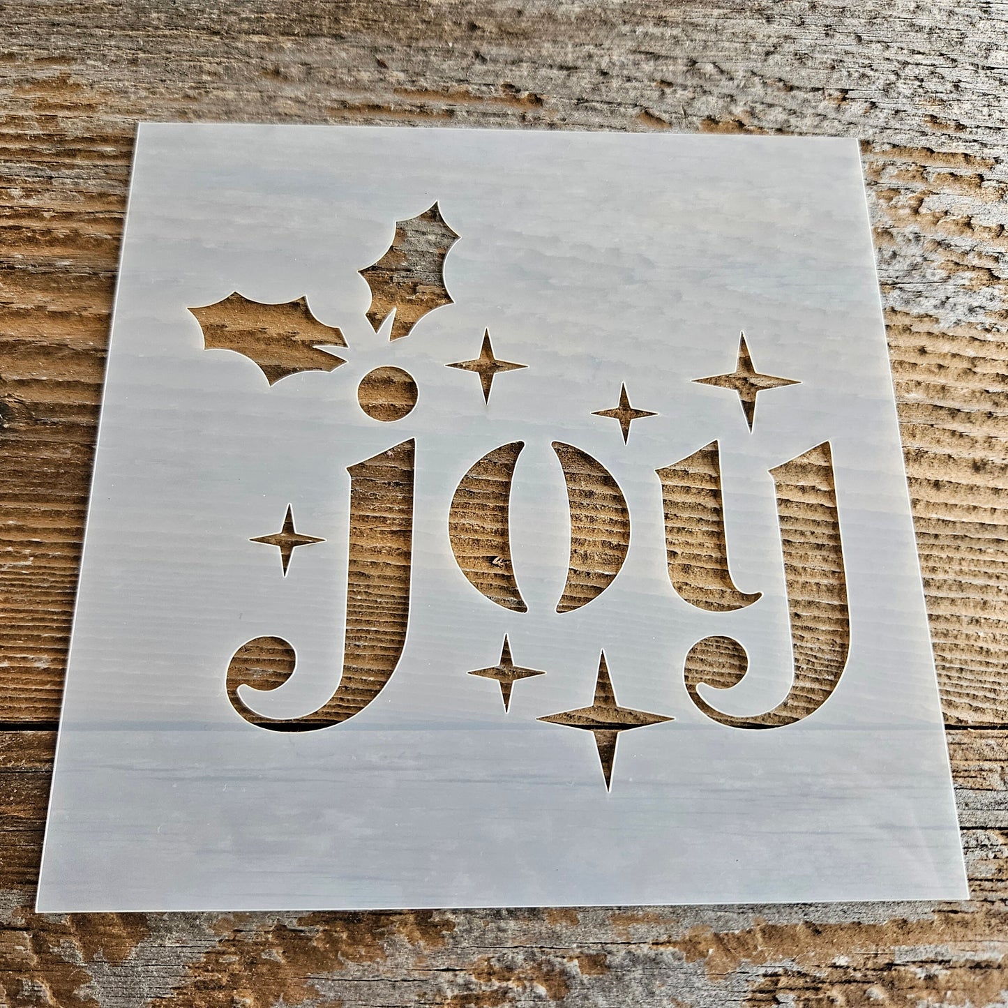 Joy Stencil Reusable Cookie Decorating Craft Painting Windows Signs Mylar Many Sizes Christmas Winter Lower Case with Stars and Holly Leaves