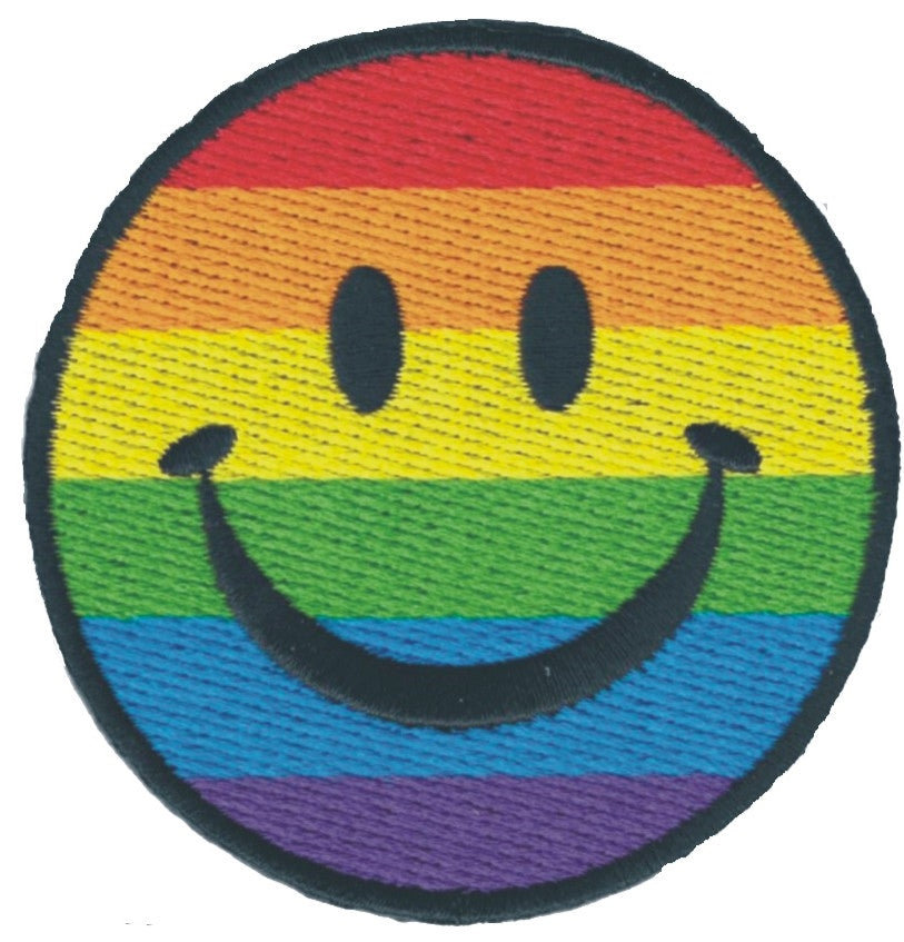 Smile face on rainbow background embroidered patch.